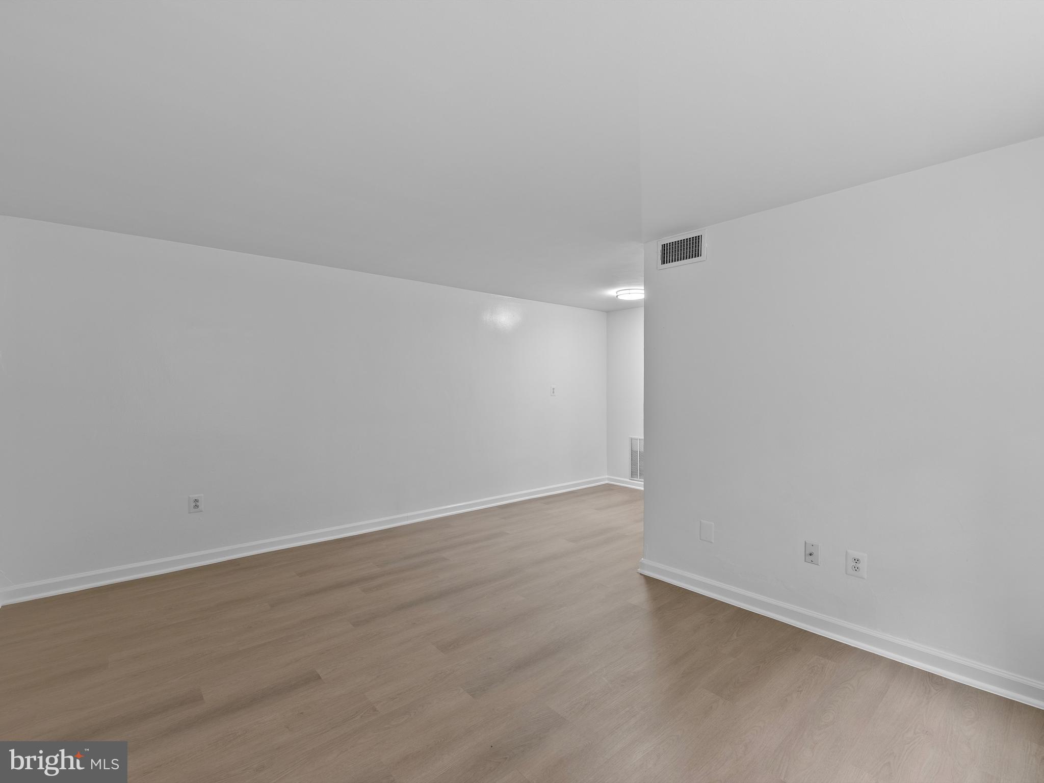 708 South Arlington Mill Drive, Unit 104 Arlington, VA 22204 - Photo 7 of 24 a view of an empty room