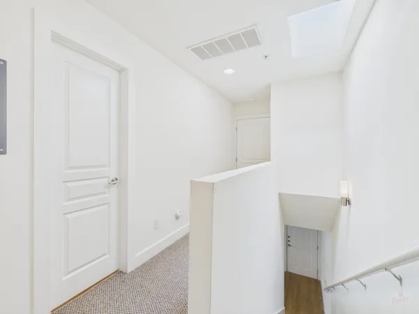 a view of way to rooms