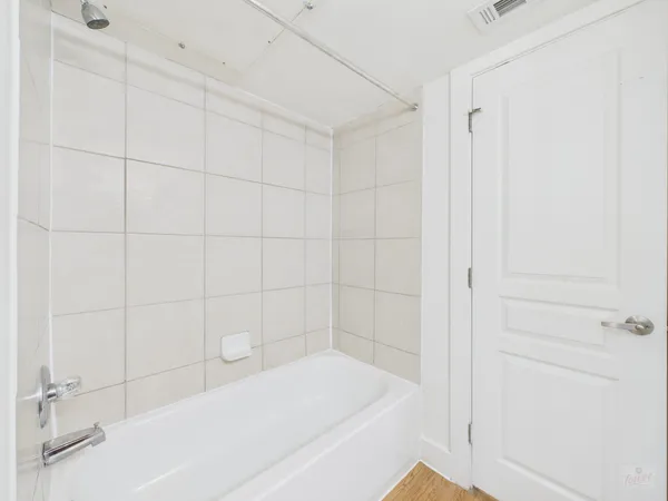 a bathroom with a bathtub