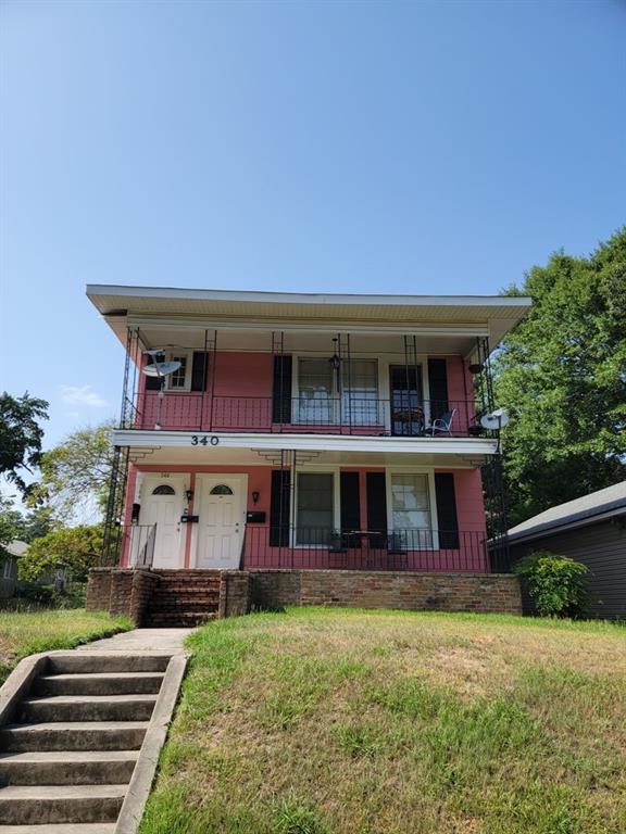 342 Prospect Street Shreveport, LA 71104 - Photo 1 of 8 a view of a house with a yard balcony and plants