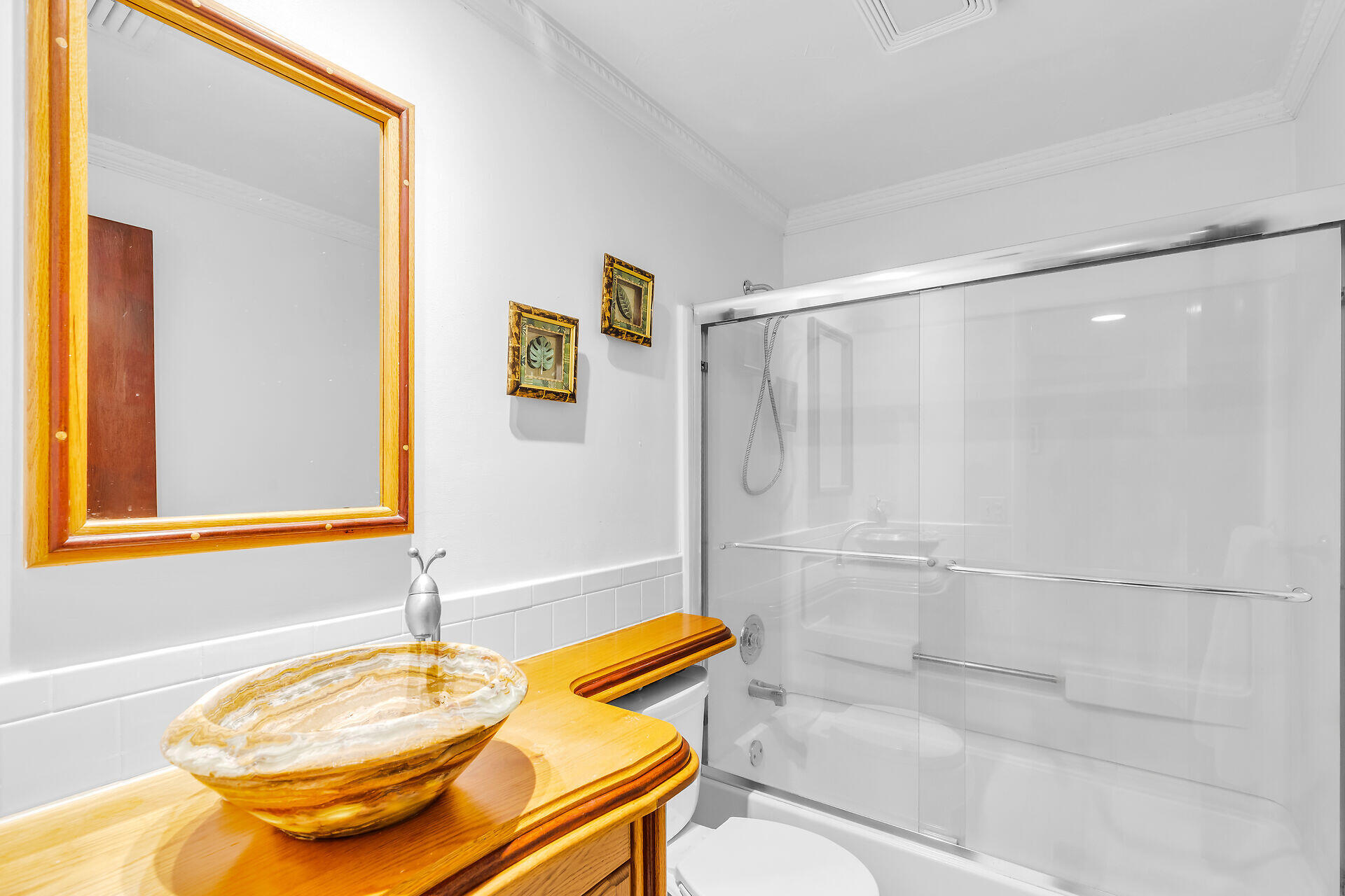 13 Bass Avenue Key Largo, FL 33037 - Photo 22 of 43 a bathroom with a table and a shower