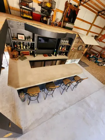 a view of a table and chairs in the garden