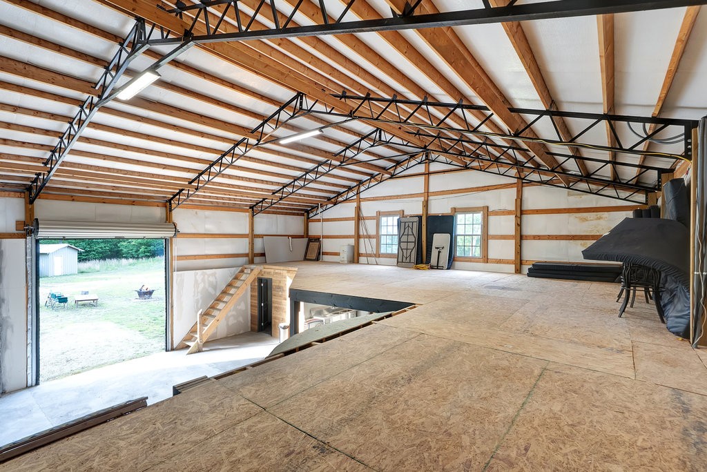 3155 Pigeon Spur Road South Pittsburg, TN 37380 - Photo 69 of 78 a view of a garage with wooden floor