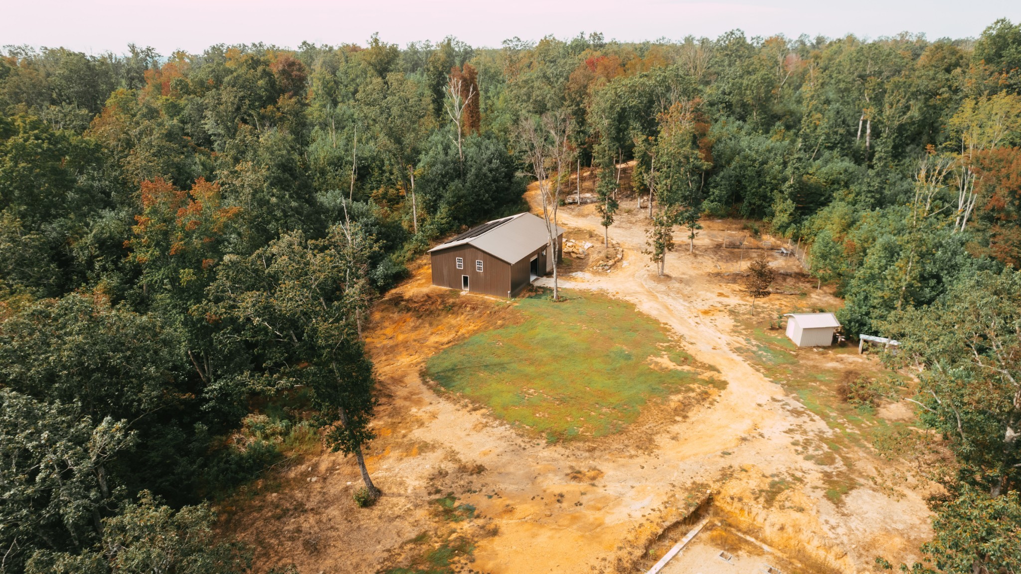 3155 Pigeon Spur Road South Pittsburg, TN 37380 - Photo 9 of 78 a view of a swimming pool and trees in the background