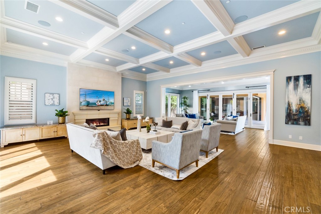 121 Treasure Irvine, CA 92602 - Photo 12 of 41 a living room with furniture and a flat screen tv