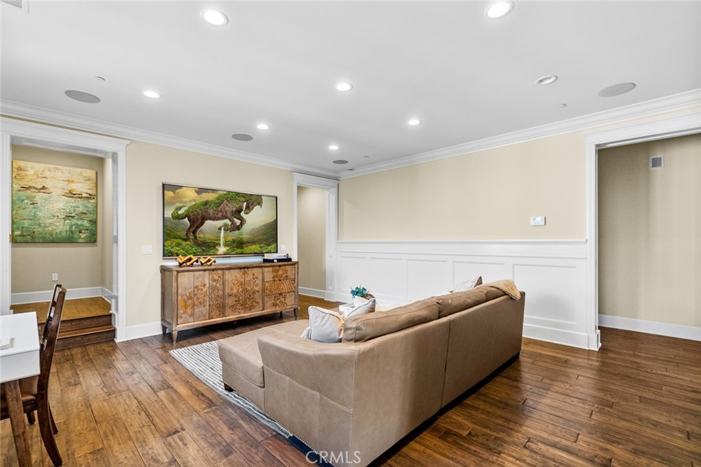 121 Treasure Irvine, CA 92602 - Photo 19 of 41 a living room with furniture and a flat screen tv