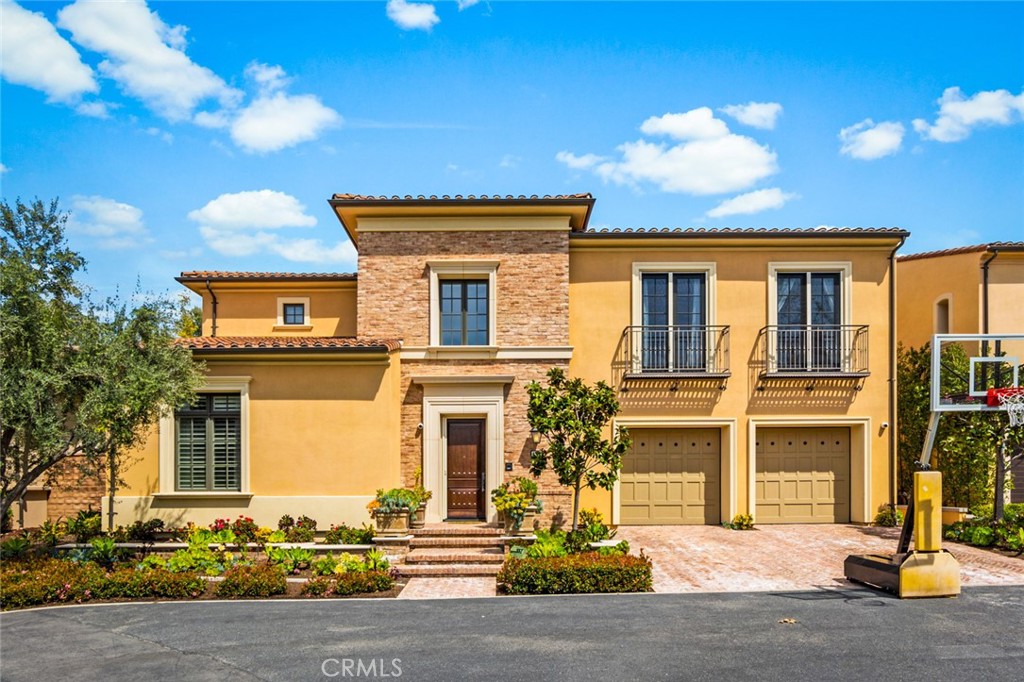 121 Treasure Irvine, CA 92602 - Photo 2 of 41 a front view of a house with a yard