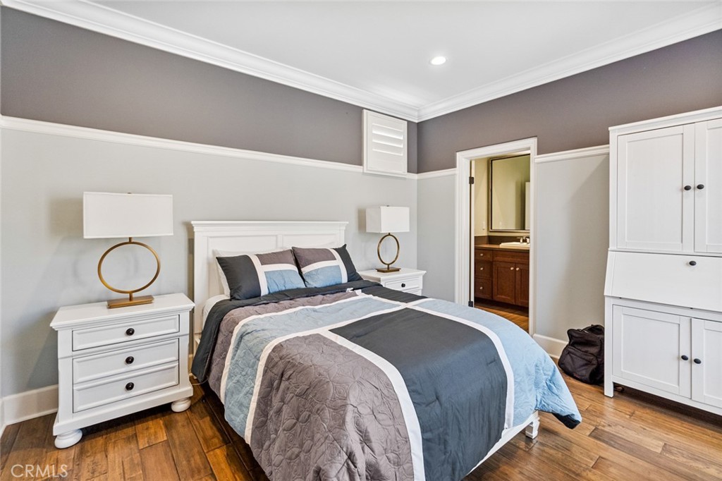 121 Treasure Irvine, CA 92602 - Photo 29 of 41 a bed room with a bed and dresser