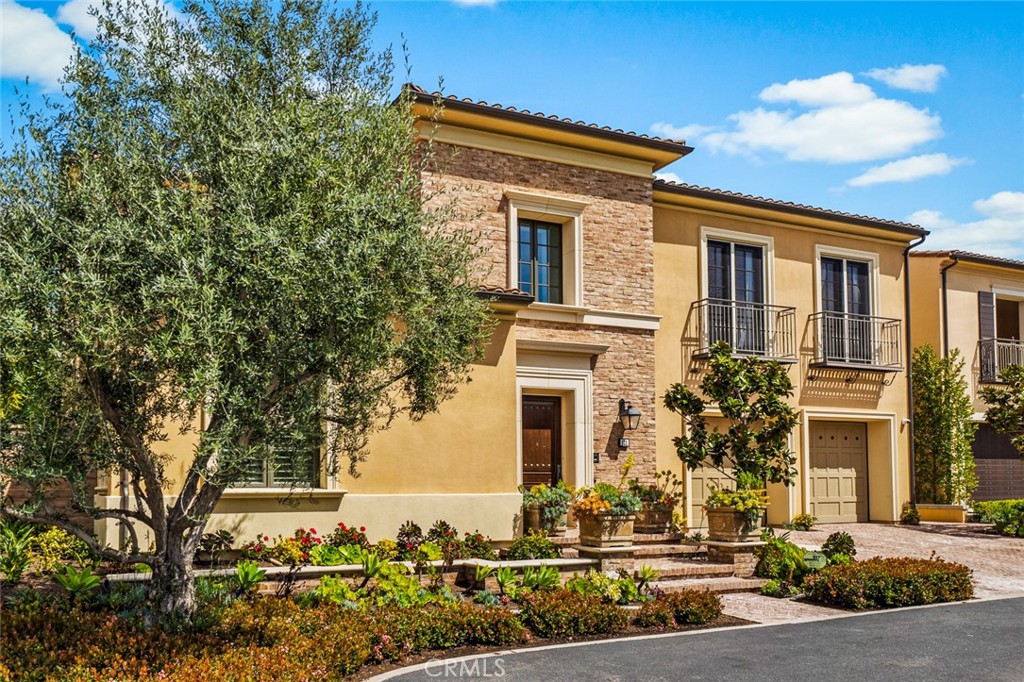 121 Treasure Irvine, CA 92602 - Photo 3 of 41 front view of a house with a yard