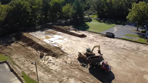 a view of a yard with patio