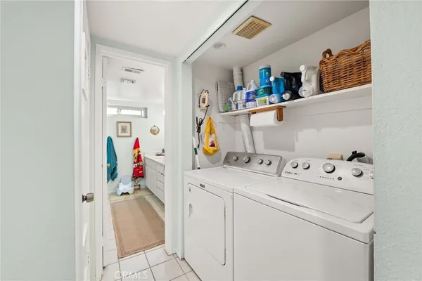 a storage room with washer and dryer