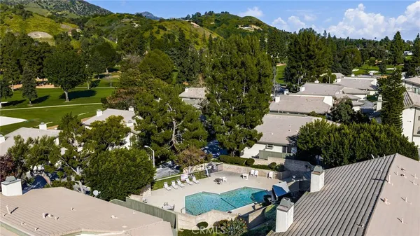 an aerial view of a house having yard