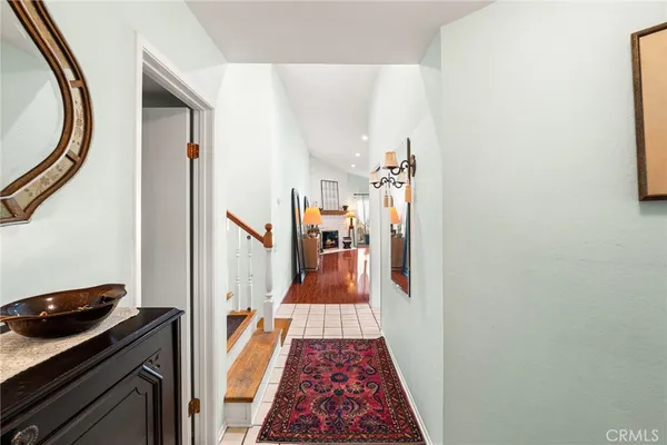 a view of a hallway view with staircase