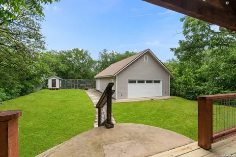 a view of a backyard with a house