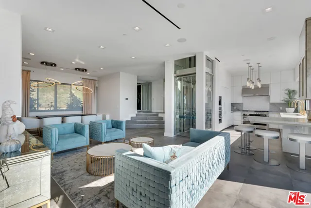 a bedroom with a bed and a fireplace