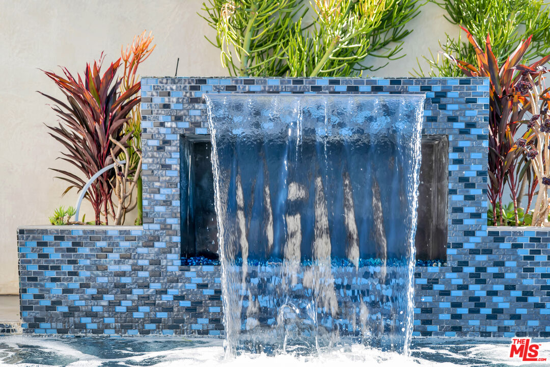 25423 Malibu Road Malibu, CA 90265 - Photo 48 of 71 a couple of potted plants in front of door