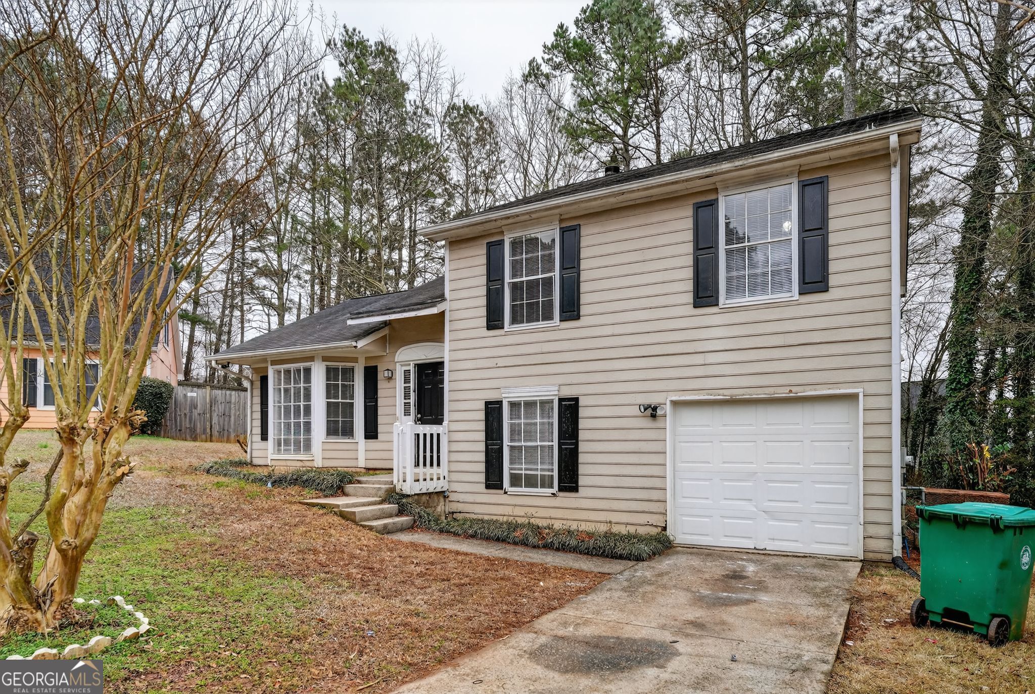 3263 River Mist Cove Decatur, GA 30034 - Photo 3 of 38 a view of a house with a yard