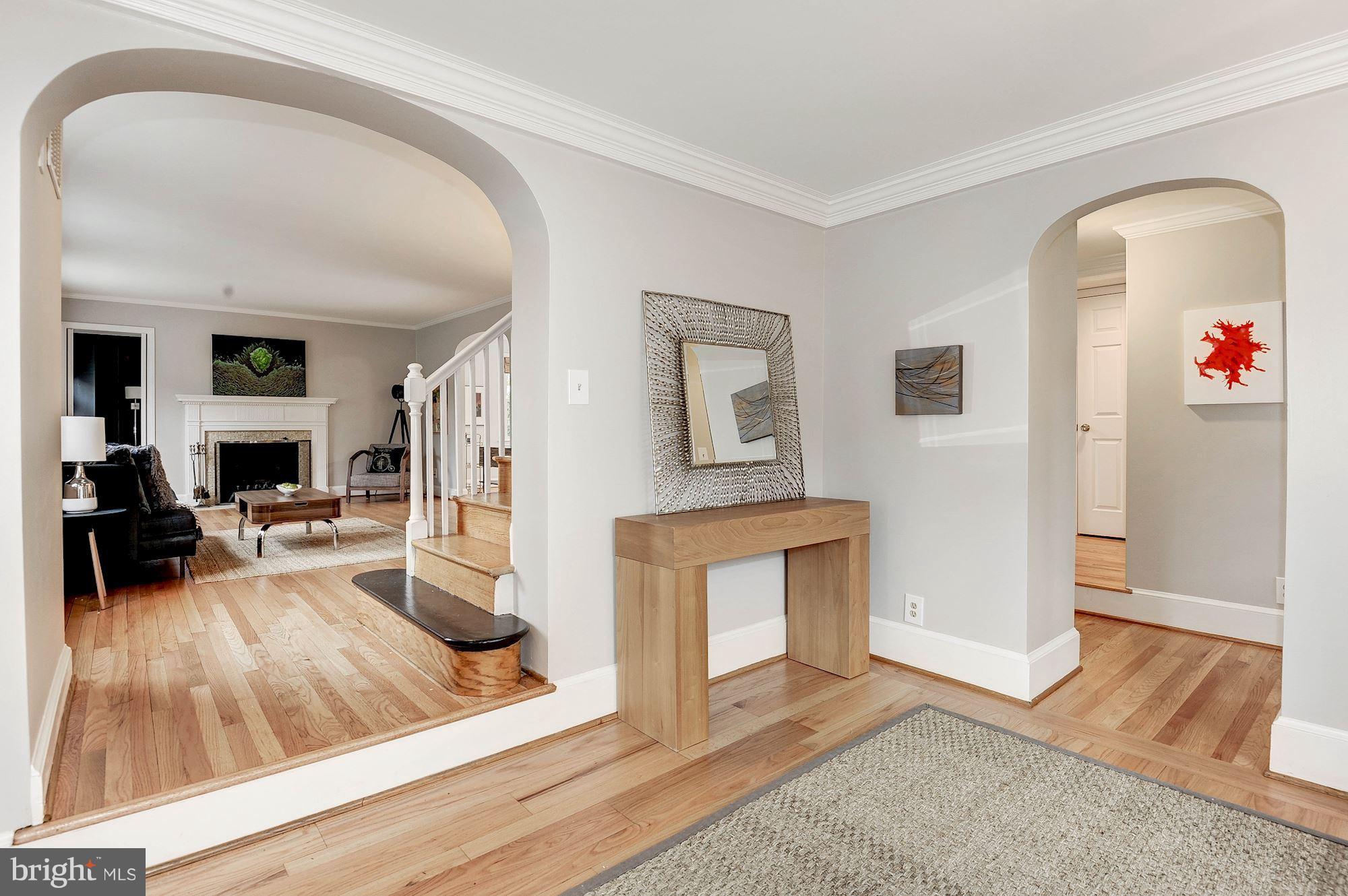 5000 Park Place Bethesda, MD 20816 - Photo 3 of 30 a living room with furniture and a fireplace