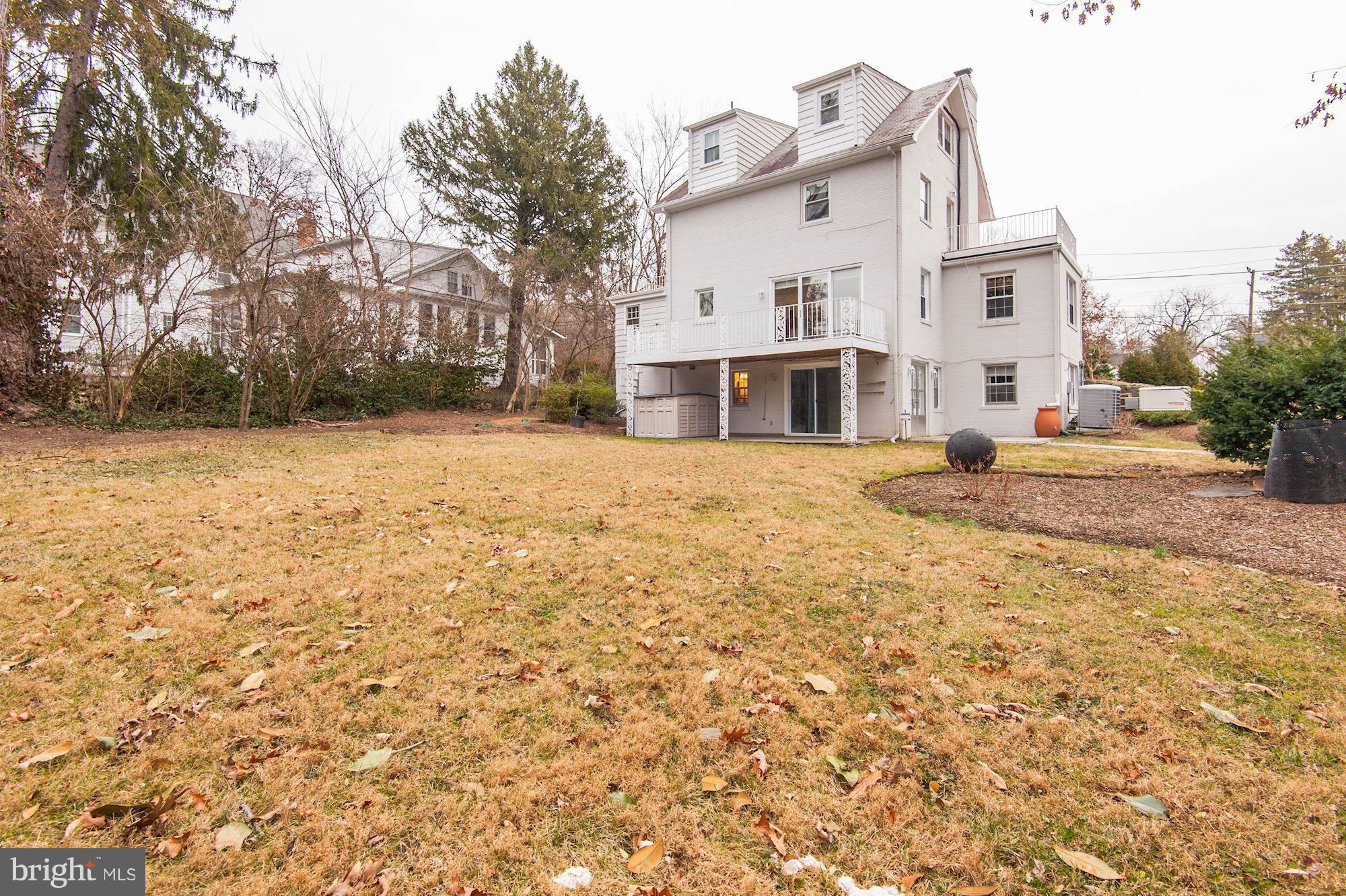 5000 Park Place Bethesda, MD 20816 - Photo 26 of 30 a front view of a house with a yard