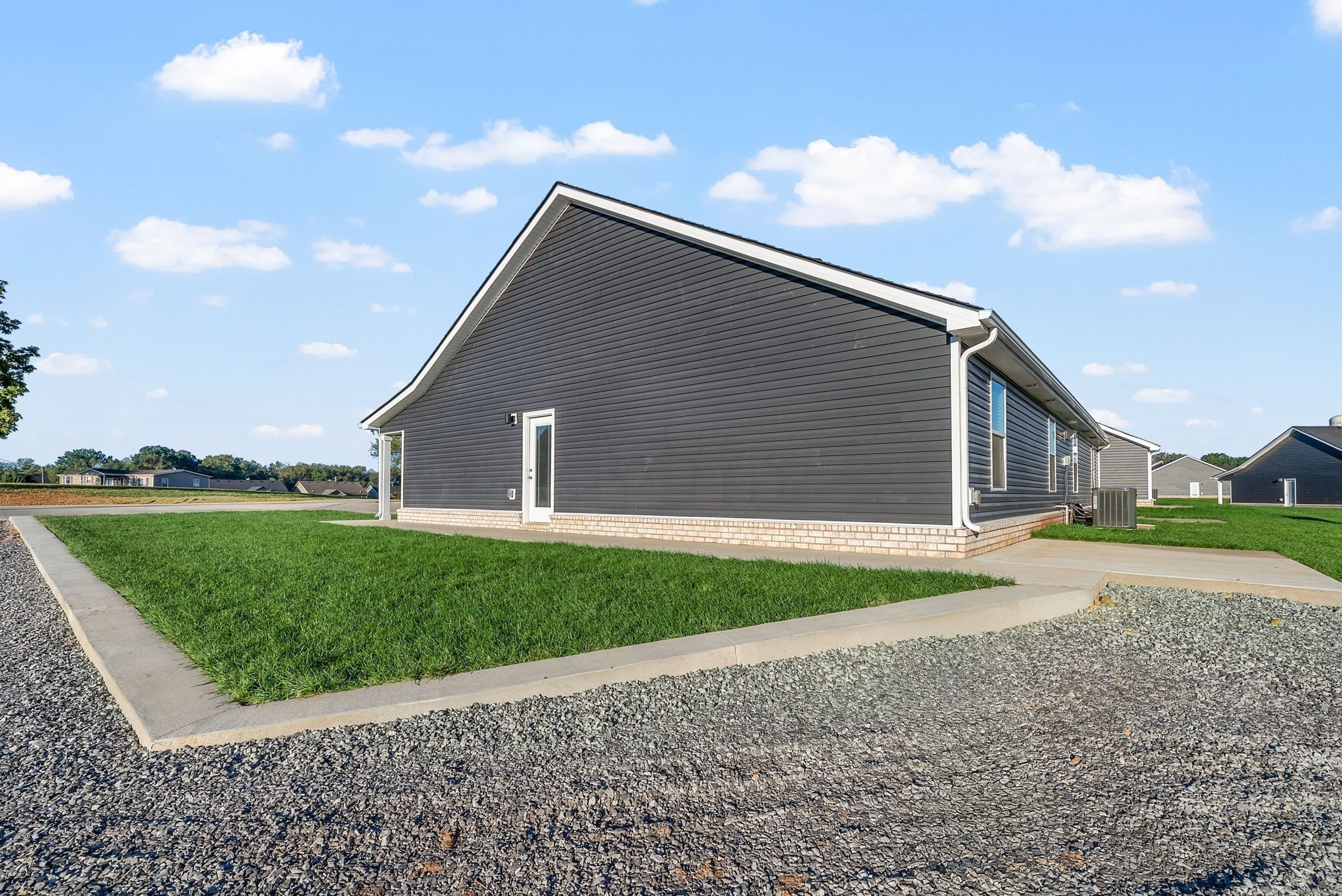 224 Primrose Way Oak Grove, KY 42262 - Photo 19 of 20 a backyard of a house with lots of green space