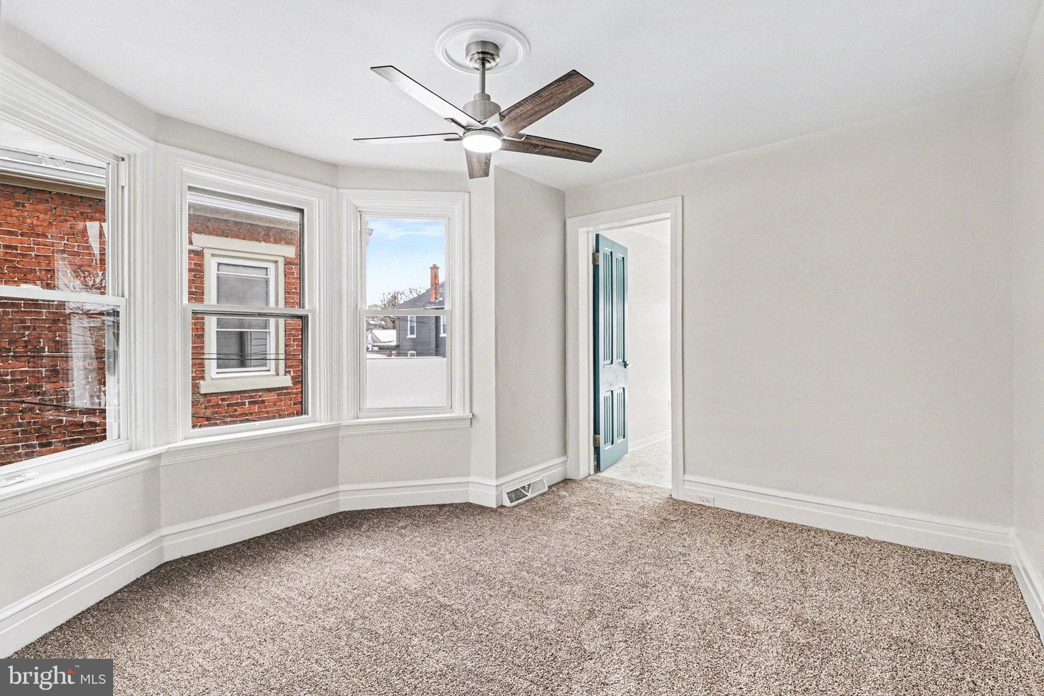 214 Chestnut Street Lebanon, PA 17042 - Photo 24 of 45 an empty room with windows and fan