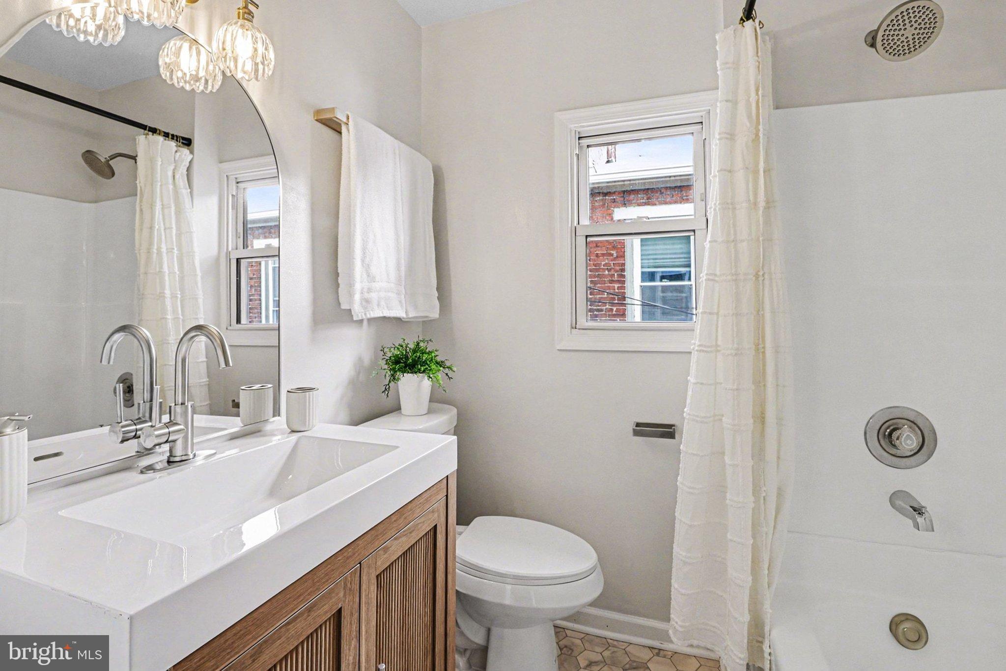 214 Chestnut Street Lebanon, PA 17042 - Photo 29 of 45 a bathroom with a sink toilet and shower