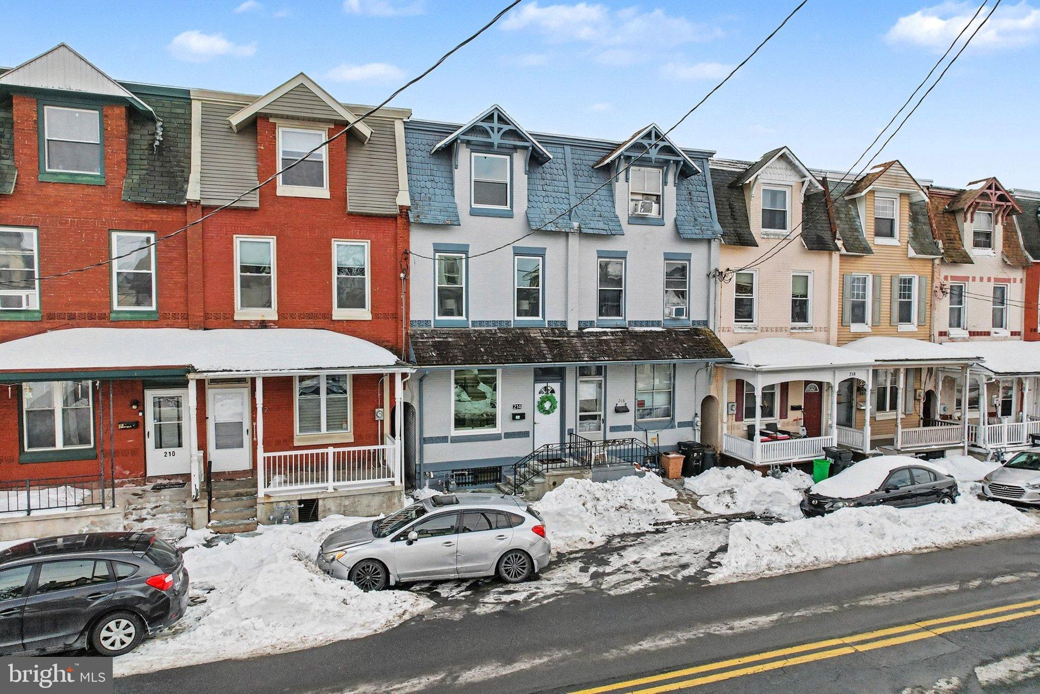 214 Chestnut Street Lebanon, PA 17042 - Photo 41 of 47 a car parked in front of a white building
