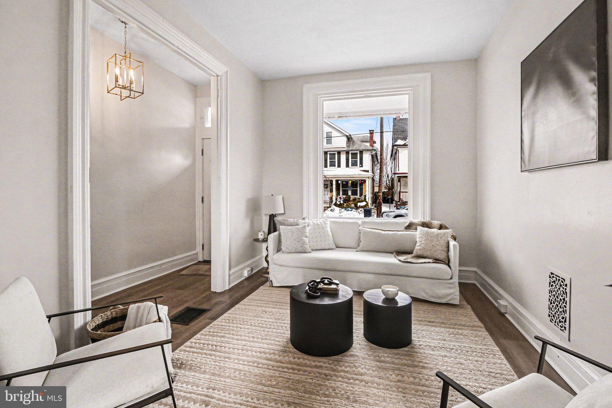 214 Chestnut Street Lebanon, PA 17042 - Photo 7 of 45 a living room with furniture and wooden floor