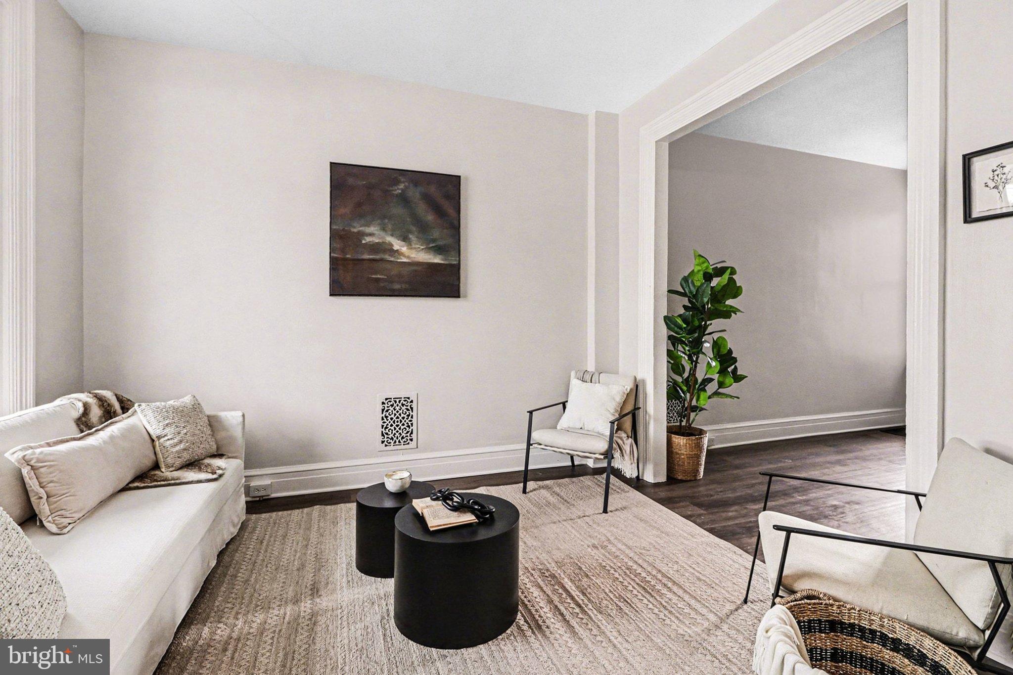 214 Chestnut Street Lebanon, PA 17042 - Photo 8 of 45 a living room with furniture and a potted plant