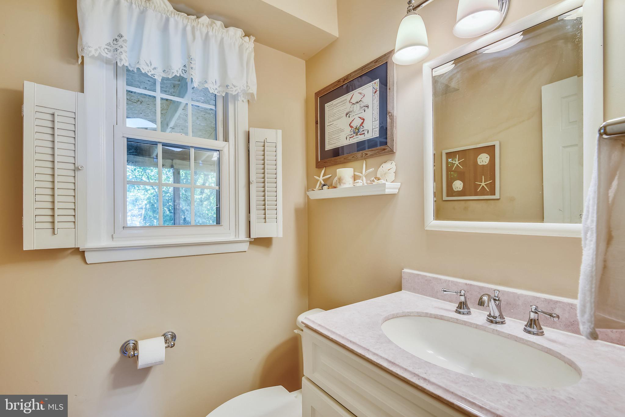 4 Severndale Road Severna Park, MD 21146 - Photo 16 of 44 Half bath off the kitchen.