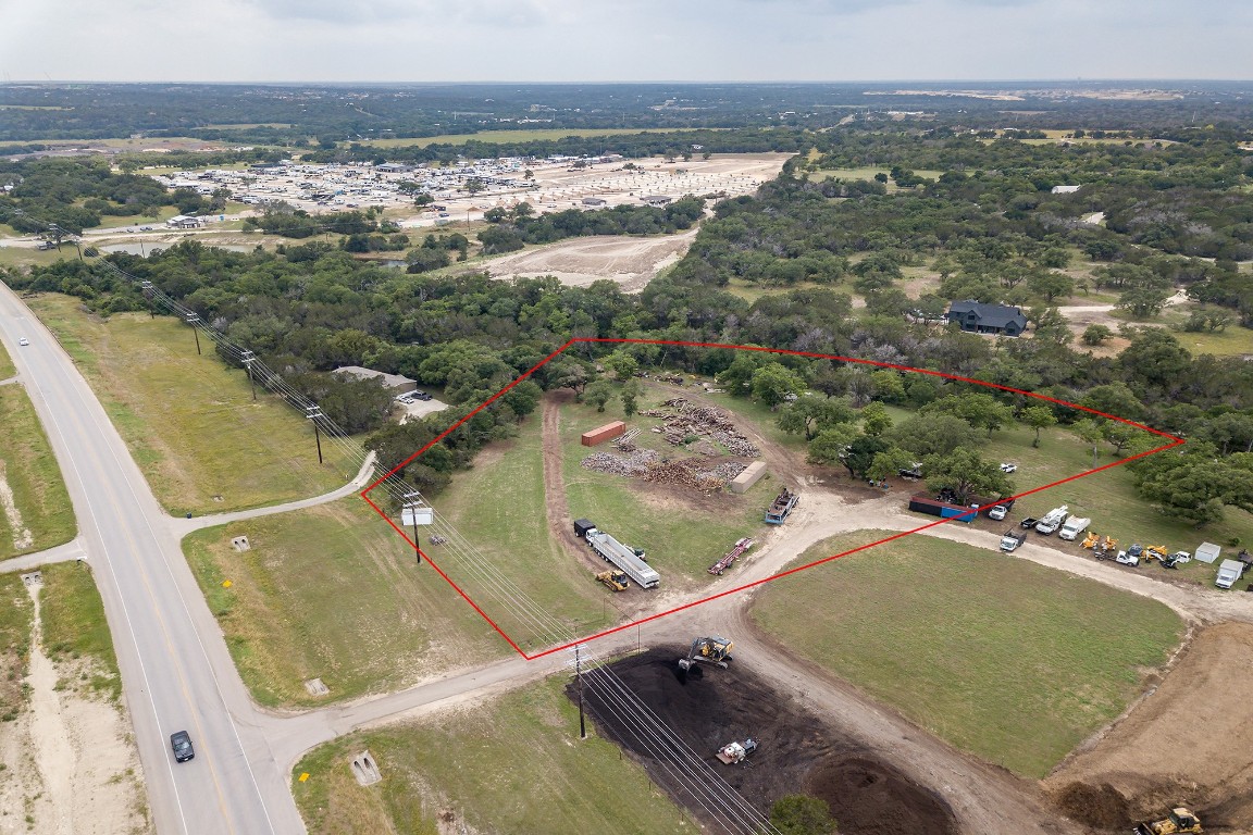 25585 Ronald Reagan Boulevard Georgetown, TX 78633 - Photo 14 of 17 an aerial view of residential houses with outdoor space