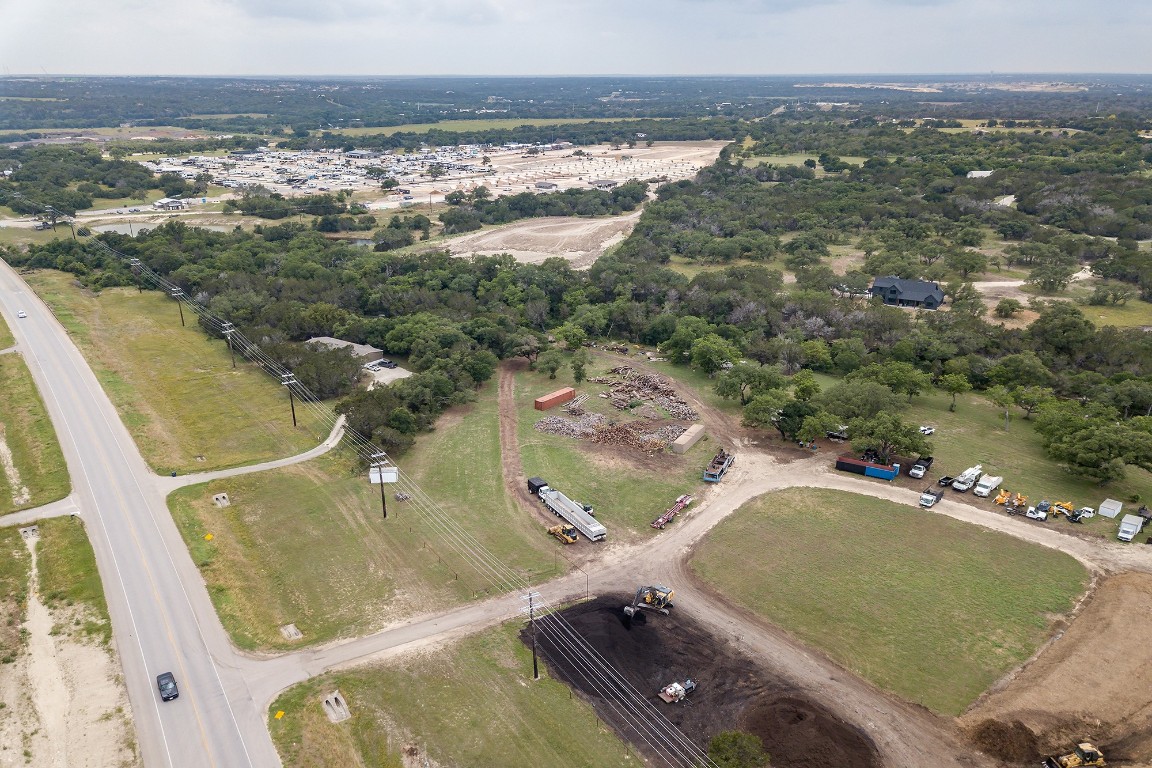 25585 Ronald Reagan Boulevard Georgetown, TX 78633 - Photo 15 of 17 an aerial view of residential houses with outdoor space