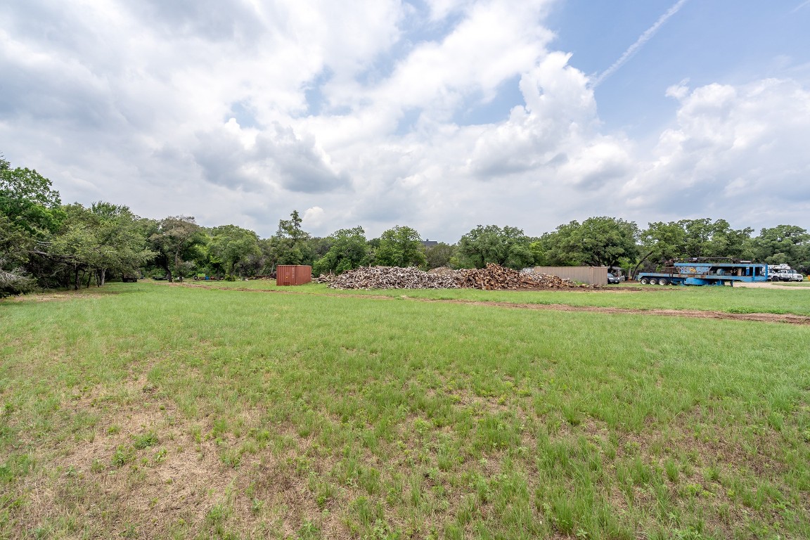 25585 Ronald Reagan Boulevard Georgetown, TX 78633 - Photo 7 of 17 a view of a green field with wooden fence