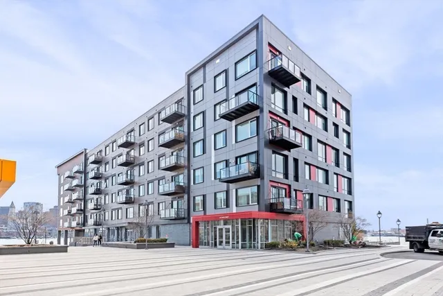 a view of a building with a street