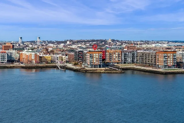 a view of a city and lake