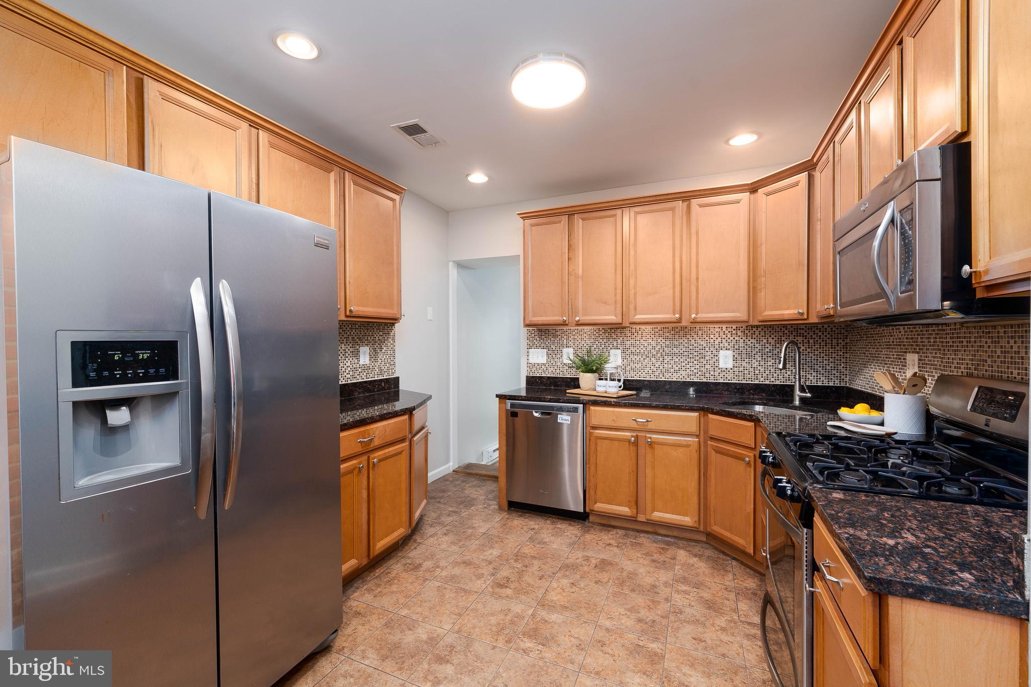 1421 Decatur Street Baltimore, MD 21230 - Photo 11 of 27 Kitchen with stainless appliances