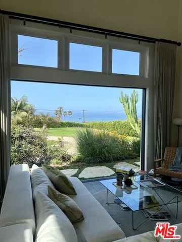 a outdoor living room with furniture