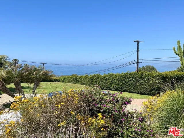 a view of a yard with an outdoor space