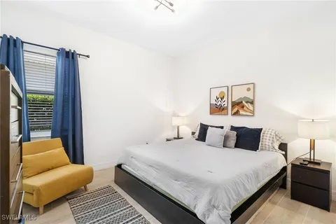 a view of a dining table and chairs in the patio