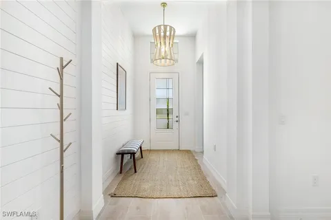 a view of a livingroom with furniture and window