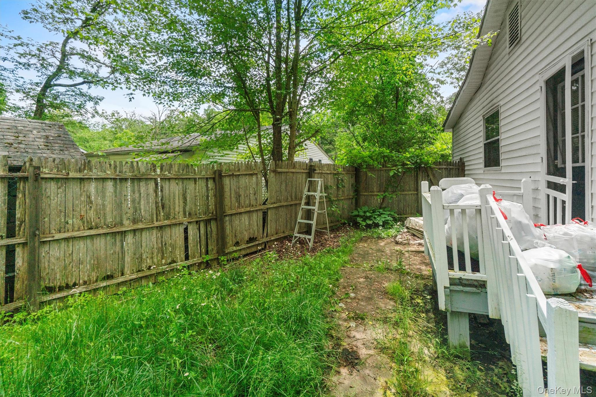 359 Lake Shore Drive Pine Bush, NY 12566 - Photo 19 of 25 View of fenced backyard