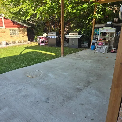 a view of a park with sitting area