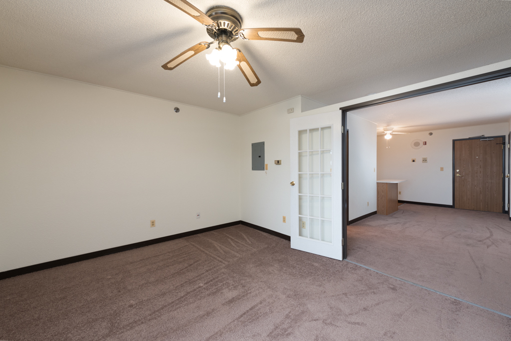 3305 Sunset Avenue, Unit 305 Waukegan, IL 60087 - Photo 12 of 23 an empty room with fan