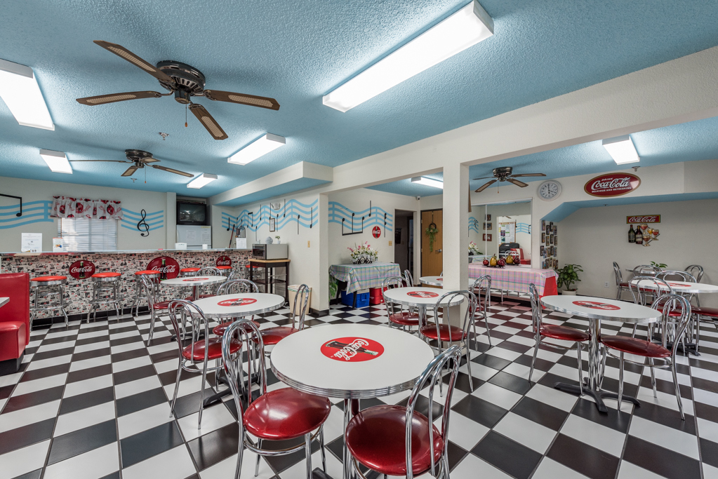 3305 Sunset Avenue, Unit 305 Waukegan, IL 60087 - Photo 17 of 23 a group of people sitting in a room
