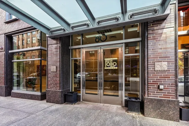 a view of a building with a glass door