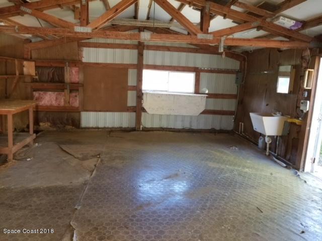 2625 Wagon Road Cocoa, FL 32926 - Photo 17 of 21 WORKSHOP/GARAGE INTERIOR