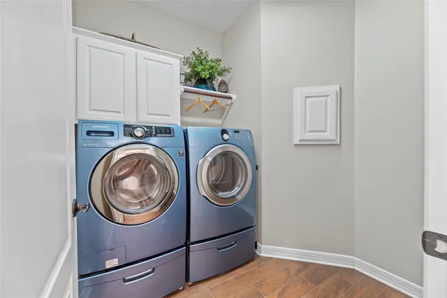 a storage room with washer and dryer