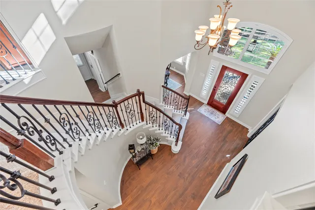 a view of a livingroom with workspace and a window