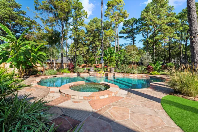 a view of a tree in front of a house