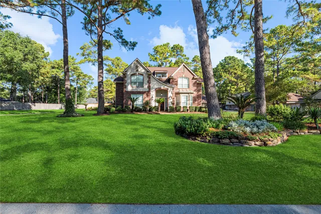 a view of yard with swimming pool and sitting area